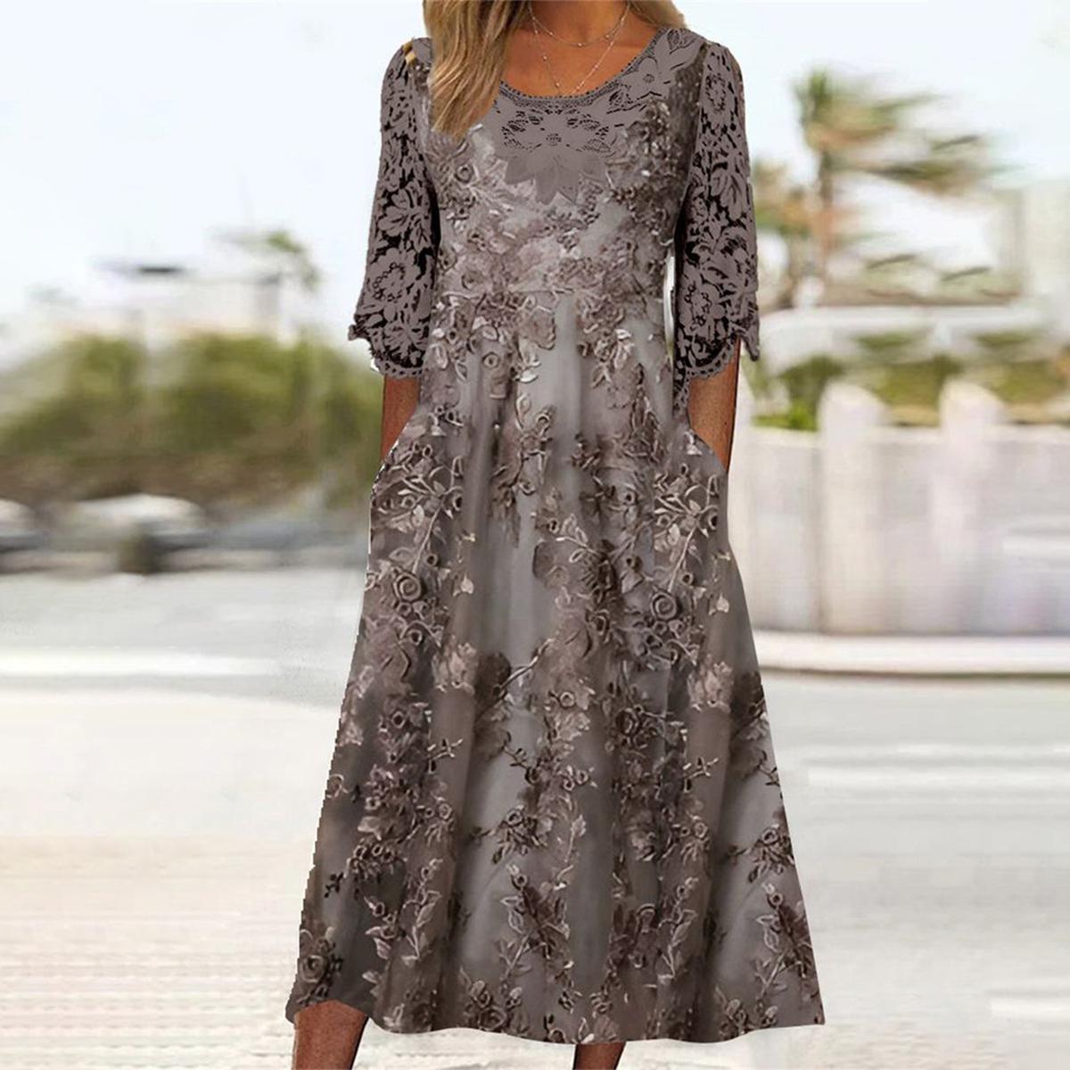 Elegantes Blumenkleid mit halblangen Ärmeln für jeden Anlass