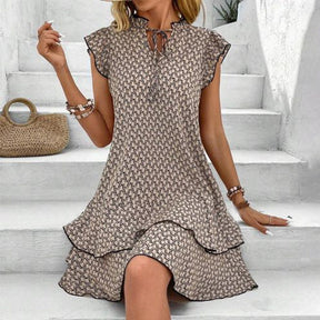 Retro Brown Sleeveless Mini Dress: Eleganz trifft auf Frühlings-Freiheit