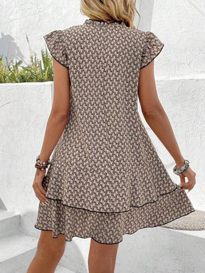 Retro Brown Sleeveless Mini Dress: Eleganz trifft auf Frühlings-Freiheit