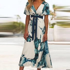 Chic Midi-Kleid mit Print und Seitentaschen - Perfekt für den Frühling